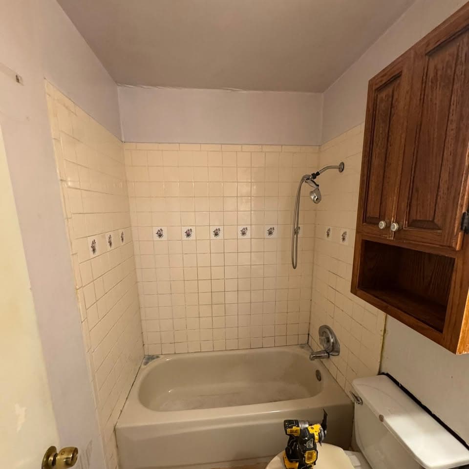 Blue bathroom before the photographed renovation